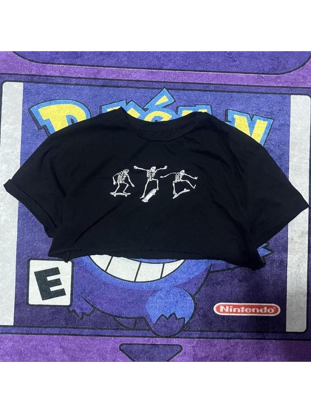 Black hand-cropped tee with skeleton design, Size: XS